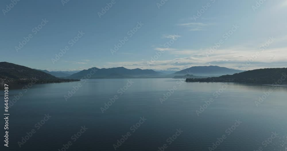 Aerial view of Lago Maggiore (Lake Maggiore) at sunrise, Meina, Novara, Piedmont, Italy. Aerial view of Lago Maggiore (Lake Maggiore) at sunrise, Meina, Novara, Piedmont, Italy.