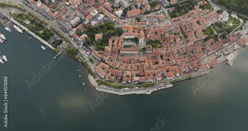 Aerial view of Arona, a small town along the Lago Maggiore (Lake Maggiore) at sunset, Novara, Piedmont, Italy. photo