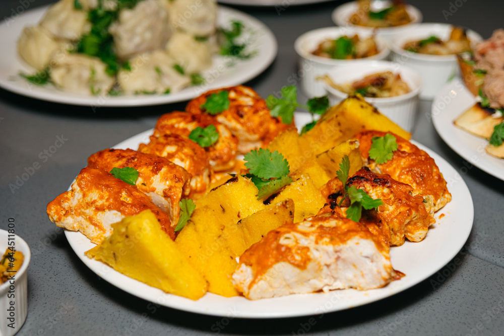 Сhicken breast rolls and baked polenta on the table. Food Buffet Brunch Catering Dining Eating Party Sharing Concept. Сhicken breast rolls and baked polenta on the table. Food Buffet Brunch Catering Dining Eating Party Sharing Concept.