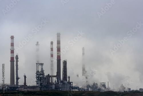 Oil refinery in the smog