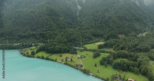 Aerial view of the Brienzersee Lake in summertime with rain and low clouds, Bern, Switzerland. photo