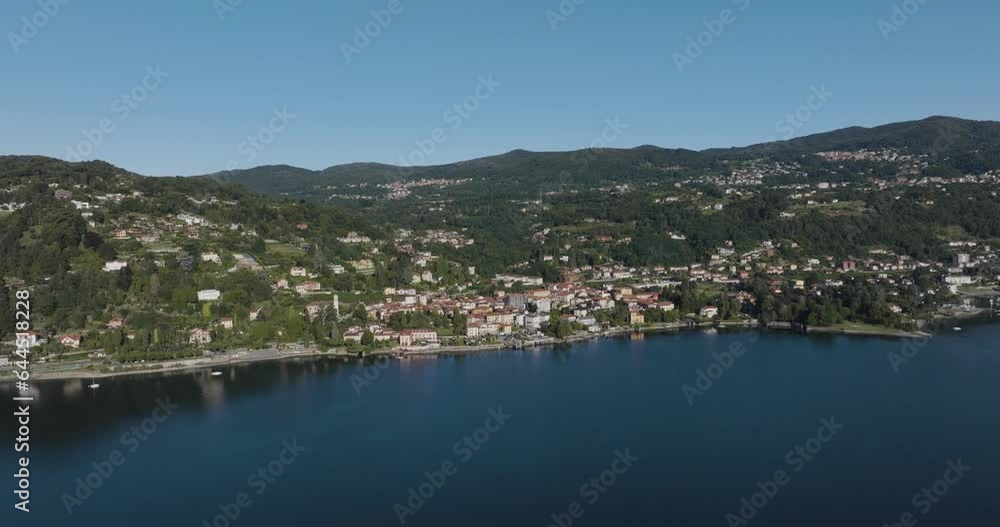 Aerial view of Meina, a small town along the Lago Maggiore (Lake Maggiore) at sunrise, Novara, Piedmont, Italy. Aerial view of Meina, a small town along the Lago Maggiore (Lake Maggiore) at sunrise, Novara, Piedmont, Italy.