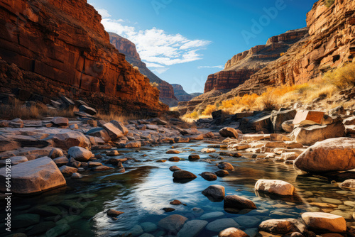 Beauty of a flowing river as it winds its way through a rugged and rocky canyon.  Generative AI.