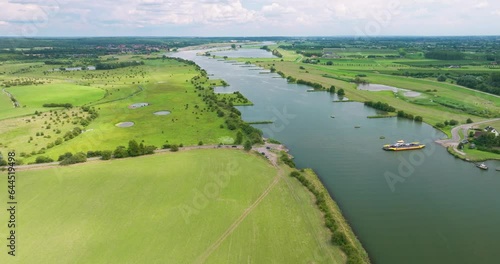 Aerial view of river Nederrijn with crossing ferry between Amerongen and Eck en Wiel, border between provinces of Utrecht and Gelderland, Netherlands photo