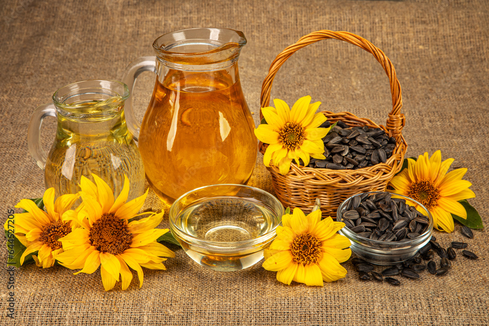 still life with sunflowers harvest. sunflower oil. seeds in a basket still life with sunflowers harvest. sunflower oil. seeds in a basket