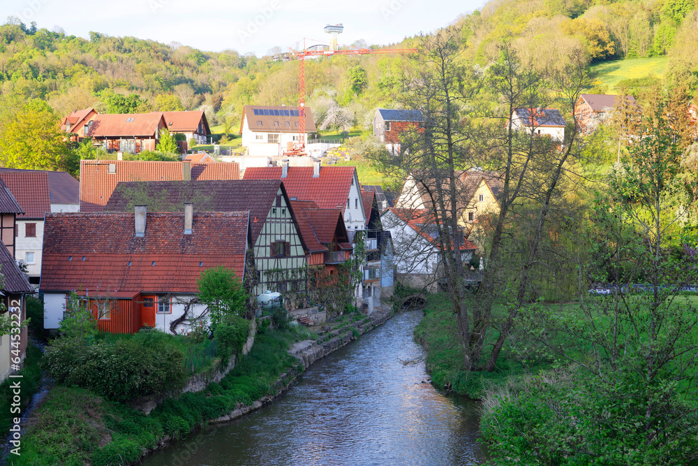 Obraz premium The River Jagst in the Village Bächlingen - Baechlingen - Langenburg, Hohenlohe, Baden-Württemberg, Germany, Europe