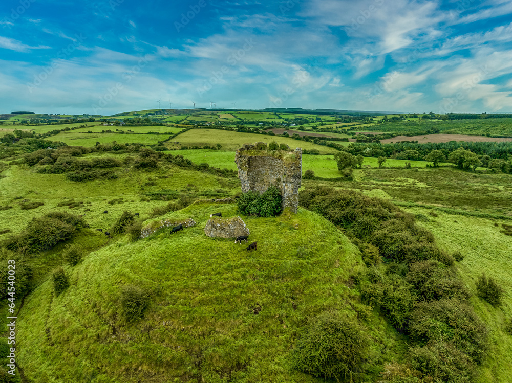 Aerial view ruins of Shanid castle in County Limerick important Anglo-Norman stronghold,  shattered shell of a polygonal tower large earthen motte with surrounding fosse and bank