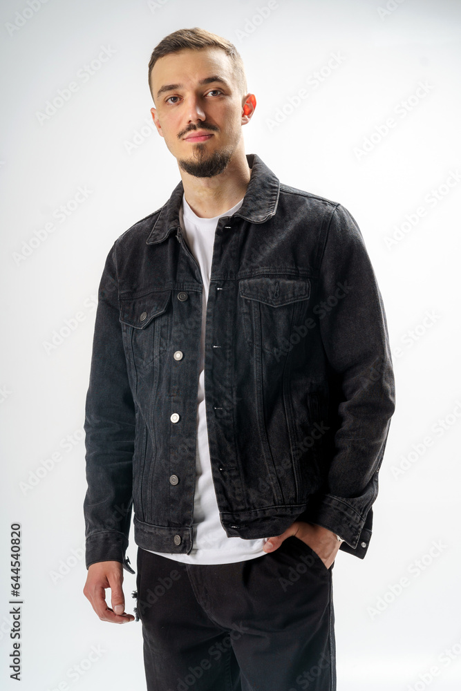 Young handsome guy on a gray studio background Young handsome guy on a gray studio background