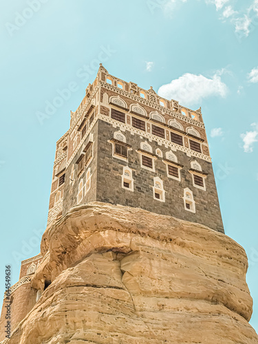 Dar Al Hajar   Stone House   is a royal palace on a rock located in Wadi Dhahr near Sana   a  architecture of Yemen.