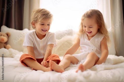 Cute sweet toddler children, tickling feet on the bed, laughing and smiling, Generative AI