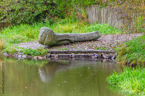 Ancient sculpture on the bank of the river 