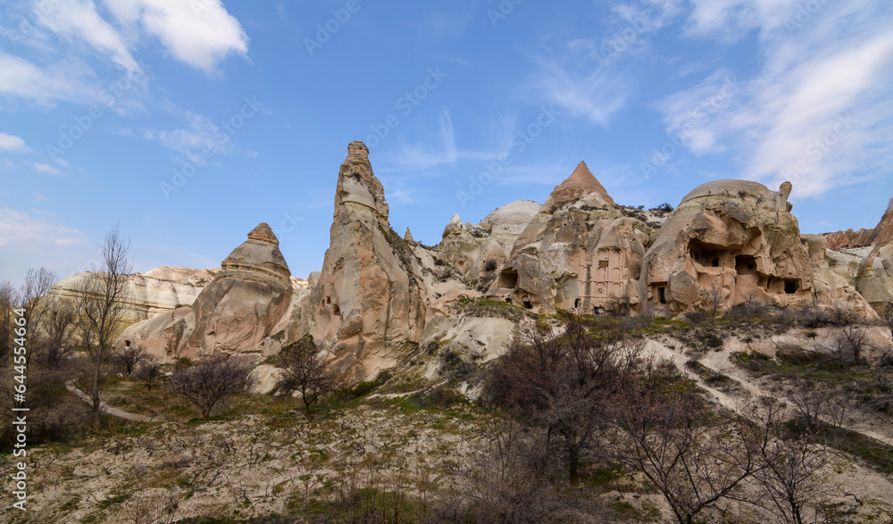 Giant rock and sand formations in touristic Cappadocia.Museum and fairy chimneys in Cappadocia, Turkey.