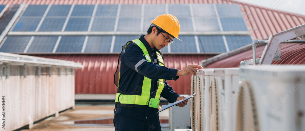 Engineers is checking the air conditioning cooling system of a major building or industrial facility. Engineers is checking the air conditioning cooling system of a major building or industrial facility.