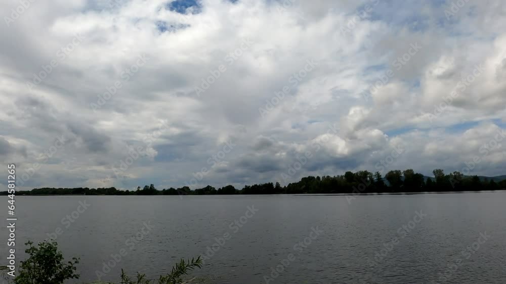 Danube near Regensburg with calm water and cloudy clouds Danube near Regensburg with calm water and cloudy clouds