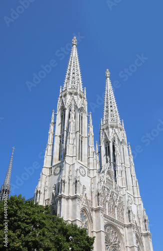 high bell towers of the VOTIVE CHURCH called Votivkirche in Vienna in Austria in central europe