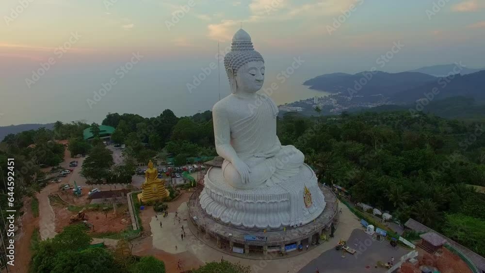 aerial view Phuket big Buddha in beautiful sunset..aerial photography scenery light through sky in sunset at Phuket big Buddha. .Phuket Big Buddha is one of the island most important aerial view Phuket big Buddha in beautiful sunset..aerial photography scenery light through sky in sunset at Phuket big Buddha. .Phuket Big Buddha is one of the island most important