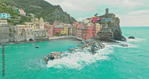 Aerial drone landscape of Vernazza, Italy Colorful Cliffside Town the Seaside Mountainous of famous Cinque Terre, Liguria, Northern Italia on Tyrrhenian sea in summer day. Coastal travel village.