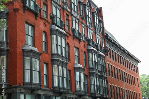 brick building in the urban skyline symbolizes real estate's enduring strength, growth, and mortgage