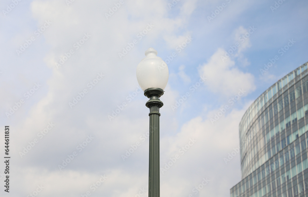 street lamp, a beacon in the city's night, symbolizes both historic charm and modern urban allure, casting a warm glow on our urban journey street lamp, a beacon in the city's night, symbolizes both historic charm and modern urban allure, casting a warm glow on our urban journey