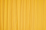 pasta abstract pattern food background on yellow pastel background