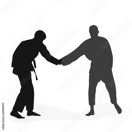 Image silhouette judoka. Judo, martial art, sportsmanship, wrestling, duel, grappling, combating, fighting, struggle
