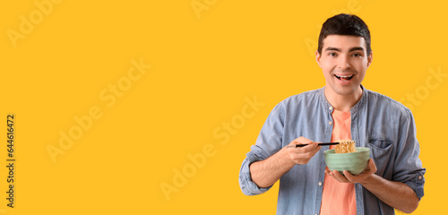 Young man with bowl of Chin...