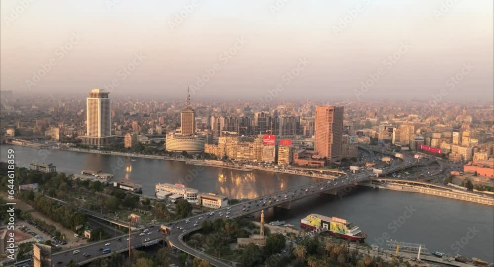 Cairo, Egyptpanoramic aerial sunset view of the Nile and downtown Cairo with traffic and boats seen from Cairo Tower - 29,Aug 2023.
Cairo, Egyptpanoramic aerial sunset view of the Nile and downtown Cairo with traffic and boats seen from Cairo Tower - 29,Aug 2023.
