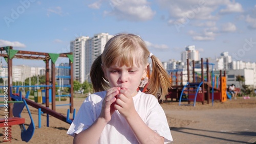 Beautiful little girl portert in the summer photo