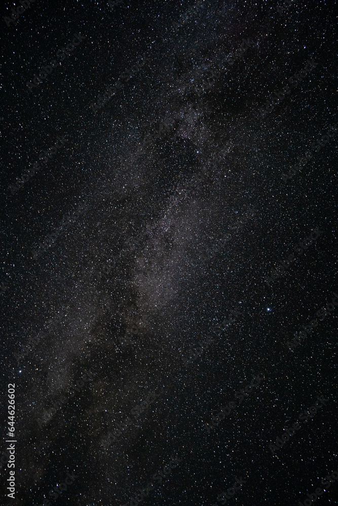 Beautiful Milky Way on a night sky. Space photography. Vertical.