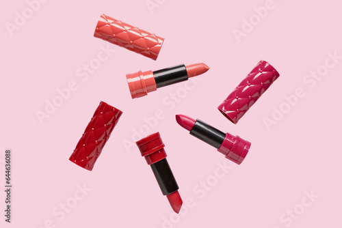 Assorted red and pink lipst...