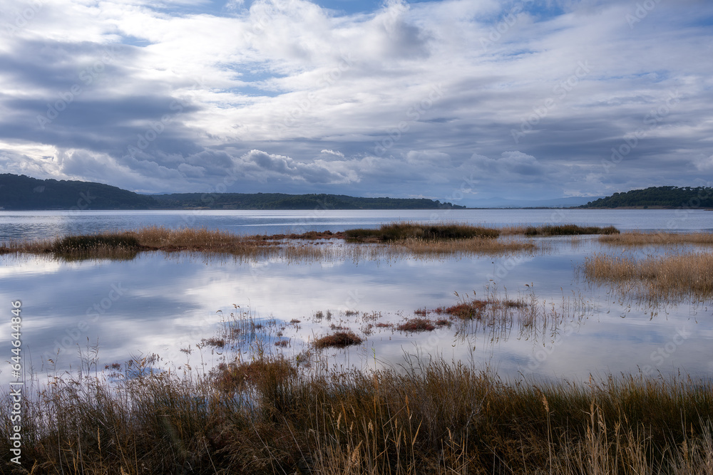 View of Gruissan lake on an autumn cloudy day, aude, Occitania, South of France View of Gruissan lake on an autumn cloudy day, aude, Occitania, South of France