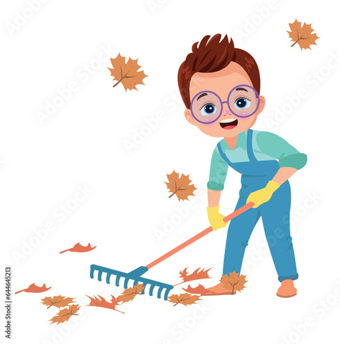 cute boy cleaning dried leaves