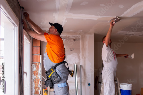 Apartment renovation. Home renovation workers crew. Builders apartment improvement or restoration works.