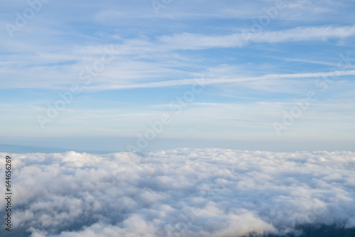 Top mountain view with sunrise sky blue and beautiful scene. The photo is suitable to use for adventure content media, nature poster and forest background.