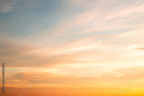 Beautiful , luxury soft gradient orange gold clouds and sunlight on the blue sky perfect for the background, take in everning,Twilight, Large size, high definition landscape photo © ISENGARD