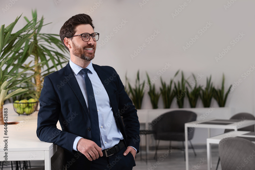 Happy real estate agent indoors. Space for text Happy real estate agent indoors. Space for text
