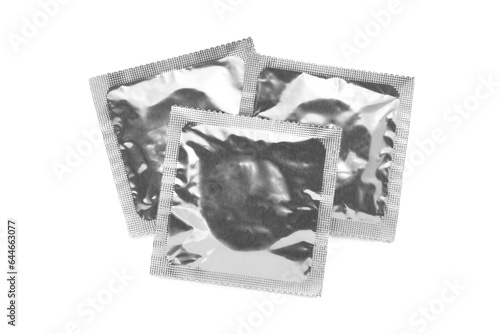 Condom packages isolated on white, top view. Safe sex