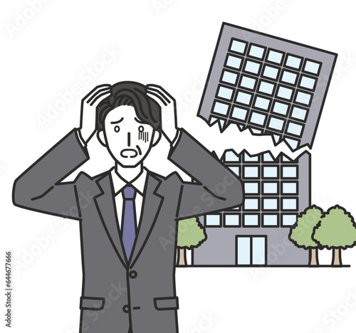 倒産して頭を抱える中年男性社員