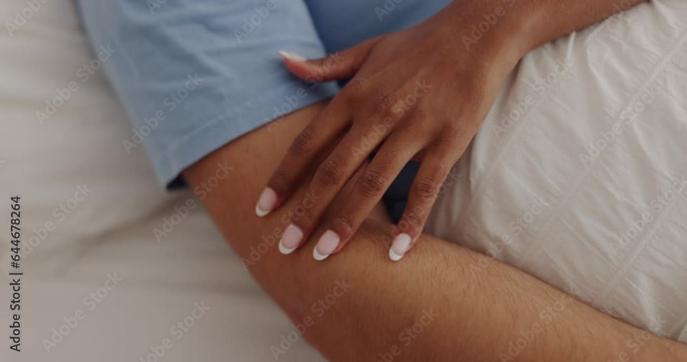 Love, intimate and hands of couple in bed for touch, care and affection at home in morning. Healthy relationship, marriage and people in bedroom laying together for bonding, commitment and embrace Love, intimate and hands of couple in bed for touch, care and affection at home in morning. Healthy relationship, marriage and people in bedroom laying together for bonding, commitment and embrace