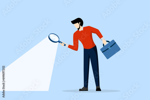 concept of looking for investment opportunity, stock market research or hidden costs and expenses, businessman looking through magnifying glass to see dollar bill sign looking for money.