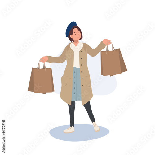 Seasonal Shopping Spree. Autumn Sale. Full-Length Stylish Woman Holding shopping bags. Happy Shopper with Autumn Discounts