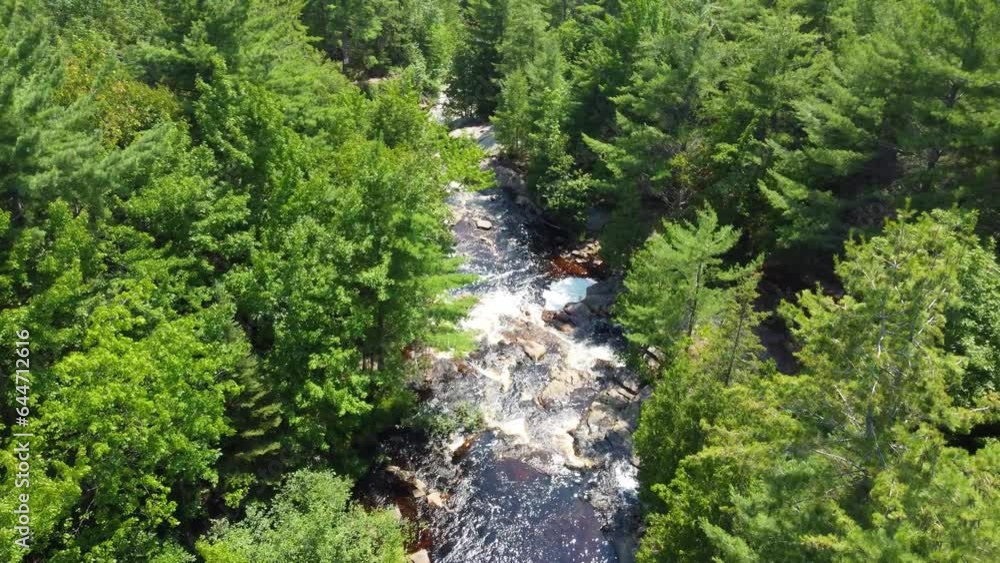 Overflight during a sunny day at Duchesnay Falls, North Bay, Ontario, Canada Overflight during a sunny day at Duchesnay Falls, North Bay, Ontario, Canada