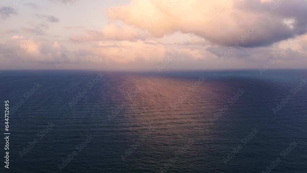 Sunset over seascape reflected on water drone aerial view Sunset over seascape reflected on water drone aerial view