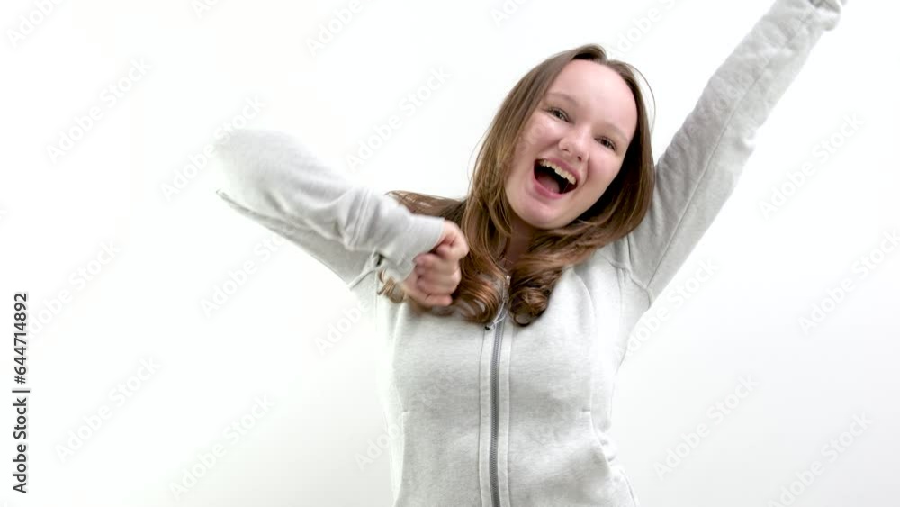 young woman performing funny dance. High quality 4k footage young woman performing funny dance. High quality 4k footage