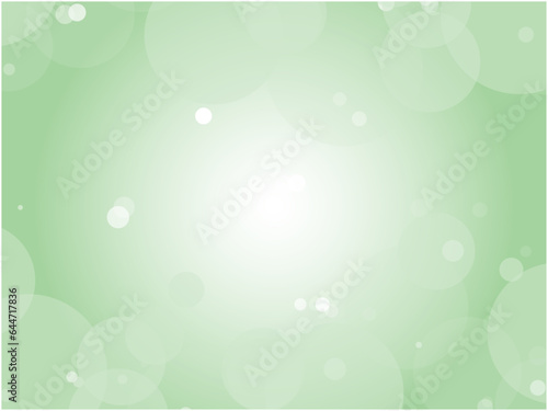 美しく儚い抽象的な水玉模様のグラデーション背景_グリーン