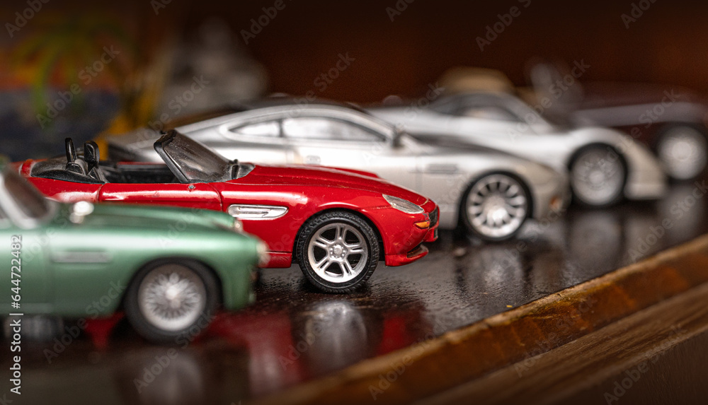  Retro car models on shelf. - obrazy, fototapety, plakaty 