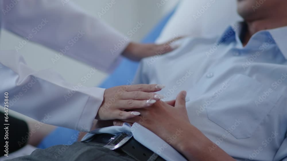 Closeup doctor hands is touching patient hand for support, cheerful when treatment and heal illness. Closeup doctor hands is touching patient hand for support, cheerful when treatment and heal illness.