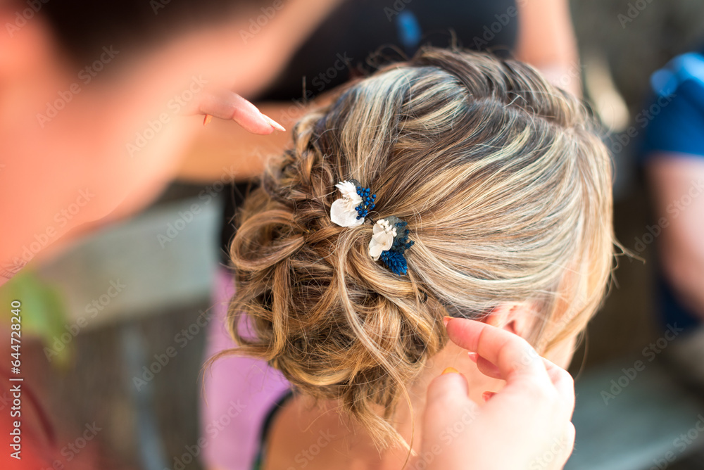 Fototapeta premium Coiffure, chignon de mariage sur cheveux blonds