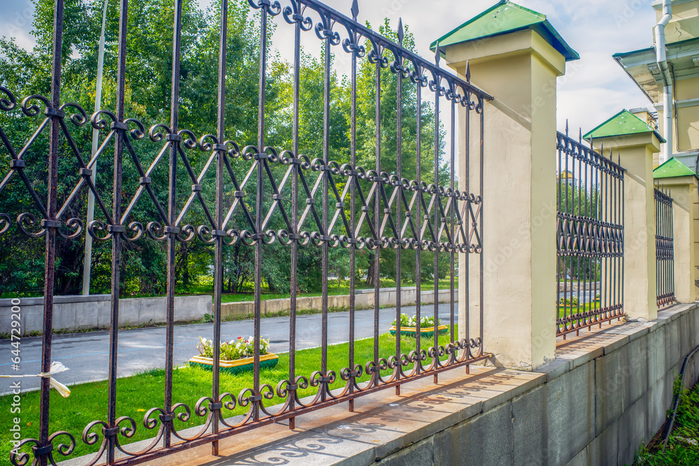 Fence of the historical estate on an autumn day Fence of the historical estate on an autumn day