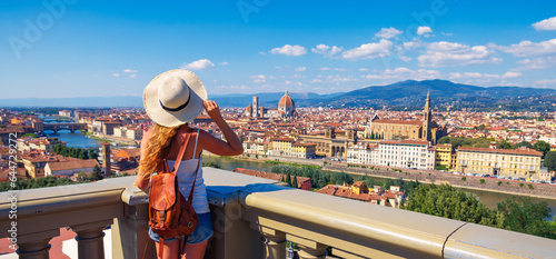 Happy woman with arms raised up enjoying panoramic of Florence Cityscape- tour tourism,travel,vacation in Italy-Europe, Firenze photo